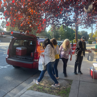 Delivery Associates preparing to deliver meals to seniors. 