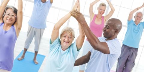 Group of seniors exercising with a coach